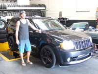 2008 Jeep Grand Cherokee SRT-8 getting a new PML Differential Cover installed