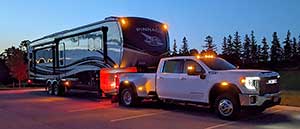 2022 GMC Sierra 3500HD Dually towing a trailer