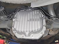 PML rear differential cover installed on 2016 F-150 XLT 2WD truck with cabling and brake line