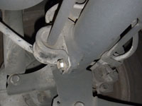 Spacer on sway bar of WJ to allow for larger PML cover