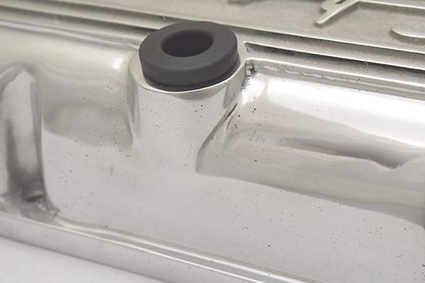 Porosity near the PCV hole on the first valve cover.