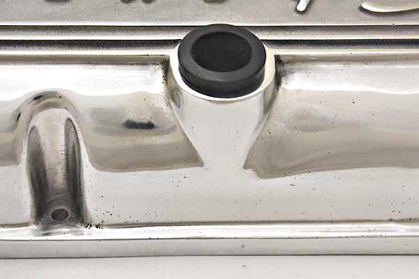 Porosity near the Breather hole on the first valve cover.