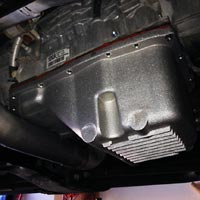 PML GM 6L90 transmission pan, deep, passenger side view of installation