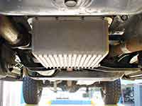 PML Ford 5R110 transmission pan installed on 2008 F250