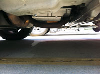 PML NAG1, 722.6 transmission pan installed on a 2006 Grand Cherokee, driver's side view