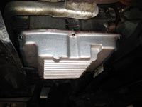 PML NAG1, 722.6 transmission pan installed on a 2009 Sprinter Van, passenger's side view