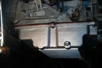 PML NAG1, 722.6 transmission pan installed on a Dodge Sprinter Van, driver's side view