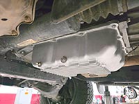 PML AB60 transmission pan installed on a 2010 Tundra, left side