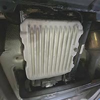 PML NAG2 trans pan installed on 2007 ML500, view of front of pan
