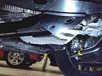 PML 10R80 pan clears frame and exhaust with plenty of distance to ground