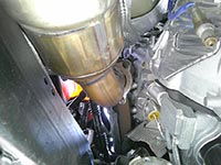 Exhaust manifold unbolted to lower the exhaust pipe