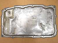 GM 10L80 stock pan with level check, top down view