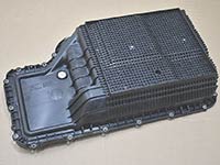 Stock Ford 10R140 Transmission Pan outside, side angle view